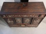 an old wooden chest with ornate carvings on it