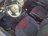 a car that has two seats in it and a steering wheel