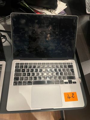two laptops that are sitting on a table