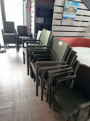 a lot of chairs that are lined up on the floor