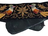 black velvet purse with embroidered birds and leaves on it