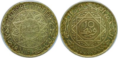 two gold coins with arabic writing on them