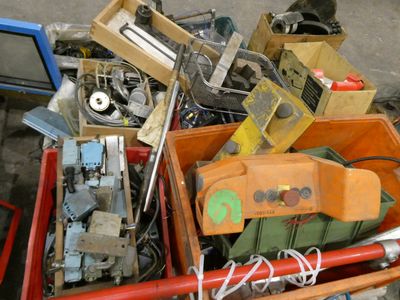 a pile of assorted items sitting in a box