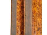 pair of art deco wall sconces in burlwood and brass