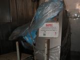 a blue plastic bag on the back of a truck