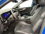 the interior of a blue car with a steering wheel and dashboard