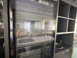 a large oven in the middle of a kitchen