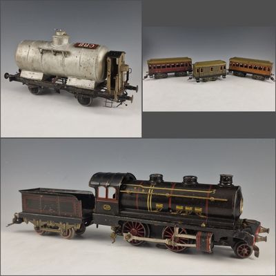 three different views of a model train engine with a tank on the front
