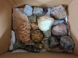 a box full of rocks and other rocks in it