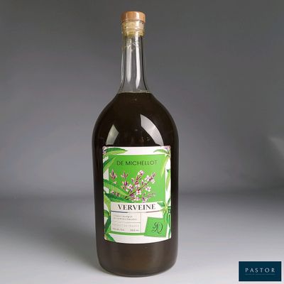 a bottle of wine that is sitting on a table