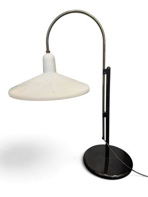 an image of a lamp that is on a stand on a white background