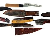 many different types of knives on a white background