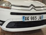 a white car that is parked in a garage