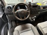 a dashboard of a car with a steering wheel and dashboard controls