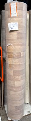 many rolls of paper on the shelf in the warehouse