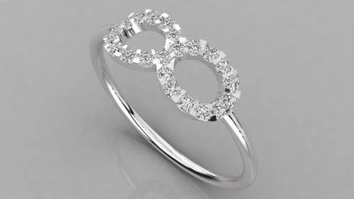 une bague en or blanc sertie de diamants sur fond gris