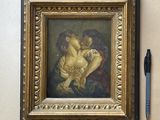 une photo d'un tableau accroché au mur, avec un stylo