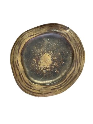 a picture of a gold plate on a white background