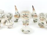 a lot of silver objects that are on a white surface