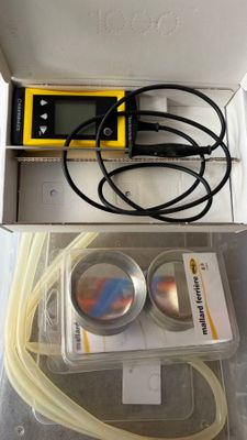 a box with a device in it that is sitting on a table
