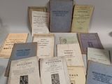a lot of old books on the table