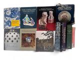 a lot of books that are sitting on a table