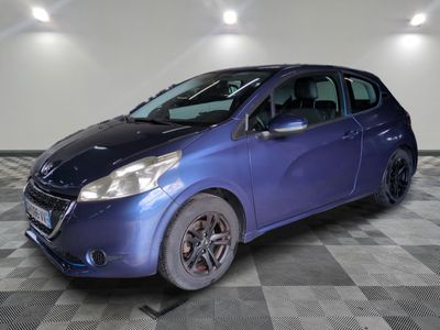 a picture of a blue car parked in a garage