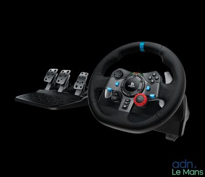 a close up of a steering wheel and pedals on a black background