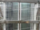 a picture of a wooden bench with a glass window