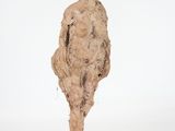 sculpture of a woman standing on a square base with a white background