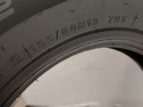 the tire of a car is shown with the tire tread marked on it