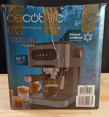 the box of the coffee machine is sitting on the table