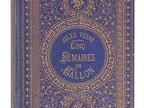 un livre bleu avec des bordures dorées et une couverture bleue