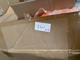 a cardboard box that has a bunch of oranges in it