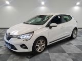 a white car is parked in a room with a checkered floor