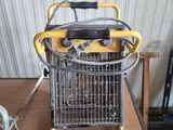 un petit radiateur portable posé sur une table dans un garage