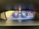 a car dashboard with a digital display on it