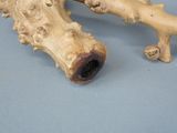 two pieces of wood that have been cut in half