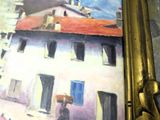 un tableau représentant une femme portant un panier sur la tête