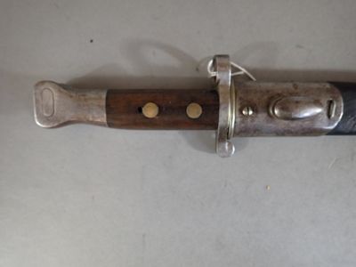 a knife that is laying on a table