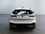the rear end of a white car in a white room