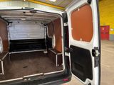 a white van that is parked inside of a building