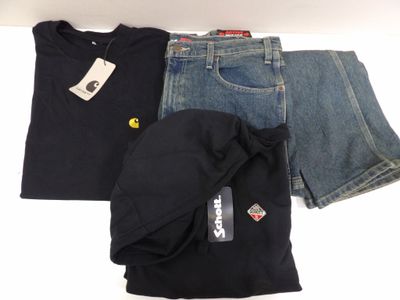 a black shirt, jeans, and a hat on a white table