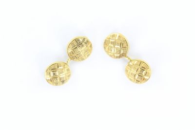 une paire de boutons de manchette en or jaune