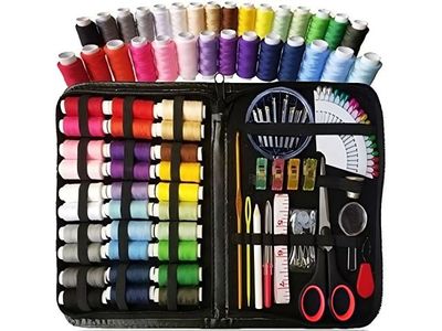 a black case filled with different colored threads and scissors