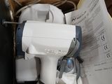 a box with a hair dryer and other items in it