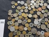 a lot of coins on a table with a price tag