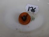 an image of a toilet bowl with a tag on it