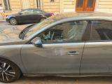 a car that is parked on the side of the street