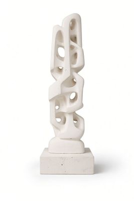 a white sculpture that is sitting on top of a table